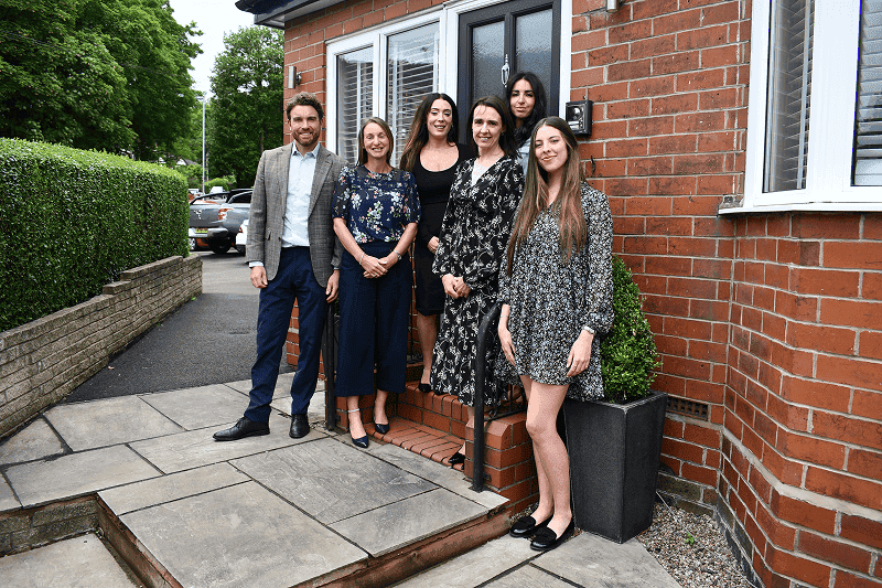 The Giliker Flynn team outside their Newcastle-under-Lyme office